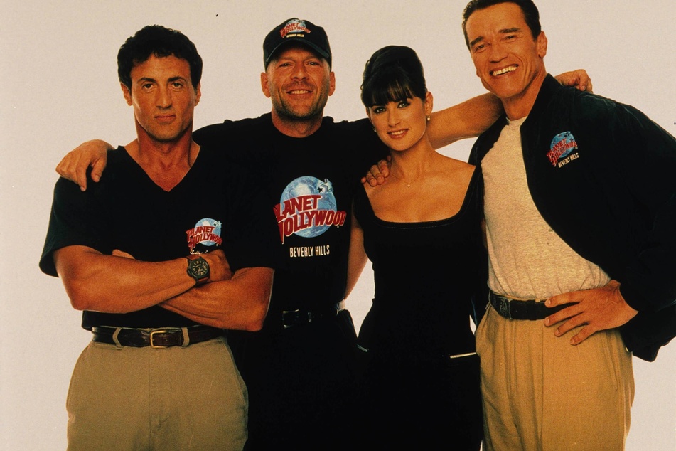 From r. to l.: Arnold Schwarzenegger, Demi Moore, Bruce Willis, and Sylvester Stallone helped launched the celebrity-themed restaurant Planet Hollywood in the 90s.