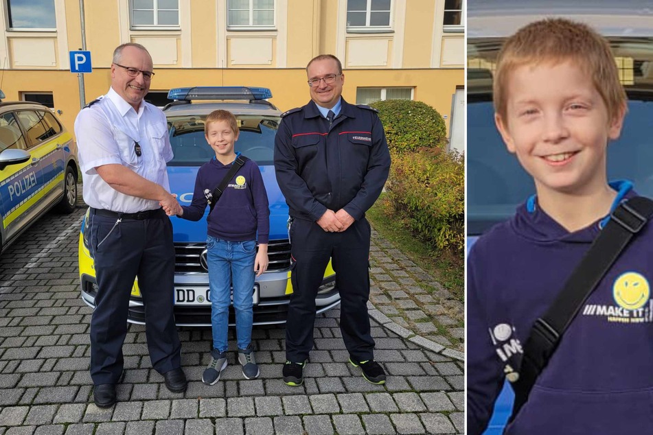 Tobias Hilbert von der Polizei Hoyerswerda (l.) und René Zschiesche von der Berufsfeuerwehr Hoyerswerda (r.) bedankten sich bei Lebensretter Finn Elias (11).