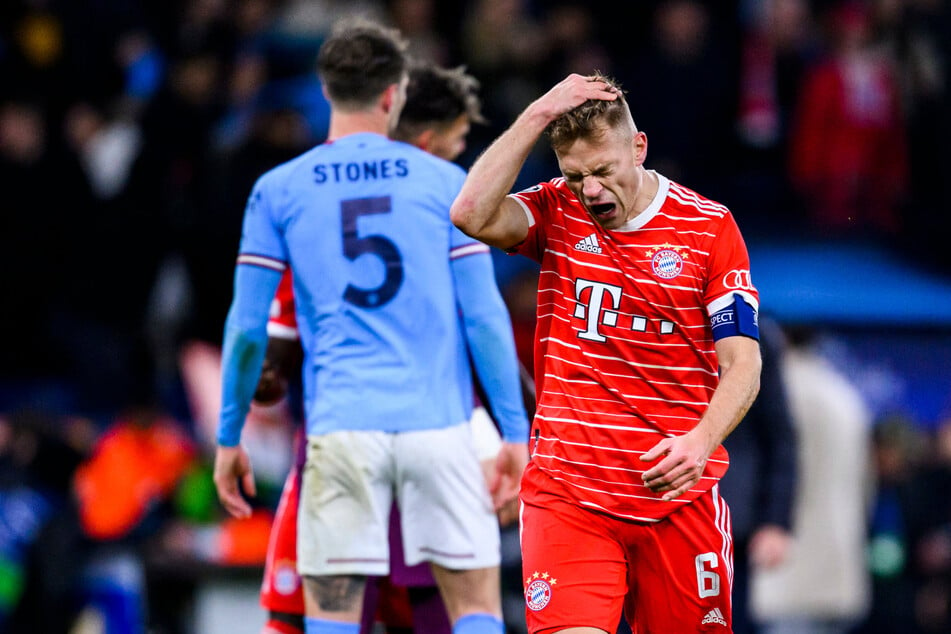 Joshua Kimmich (rechts) und den Münchner Bayern steht noch ein langer Weg zur Deutschen Meisterschaft bevor. Liga-Kontrahent Borussia Dortmund ist nur zwei Punkt entfernt.