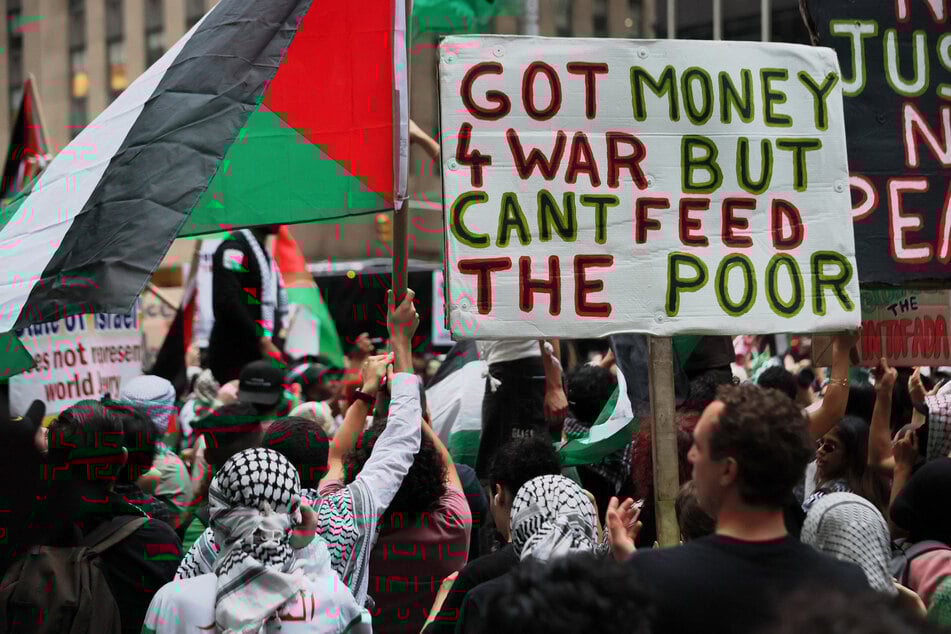 Palestine solidarity protesters gather outside the Newscorp headquarters in New York City on October 7, 2025.