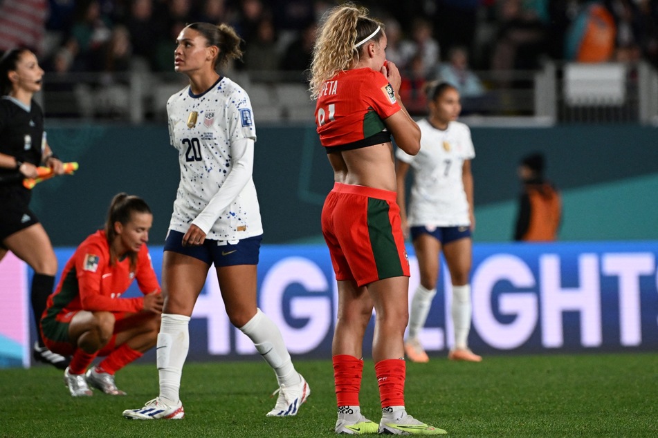 The USWNT made it through to the World Cup last 16 after Portugal's Capeta (c.) missed a huge chance in injury time.
