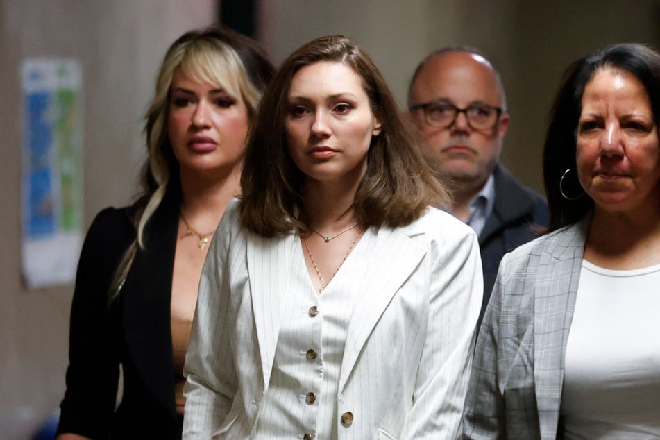 Jessica Mann (c.) has accused Harvey Weinstein of raping her when she was a 27-year-old aspiring actor.