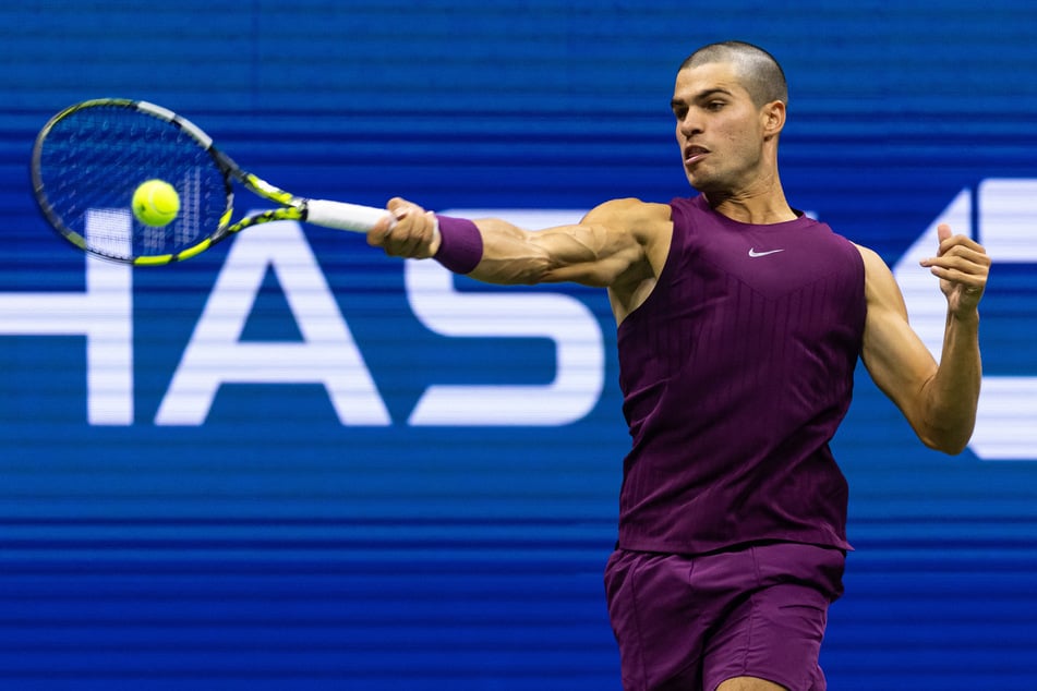 Carlos Alcaraz of Spain hits the ball against Reilly Opelka of the US in the first round of the men’s singles at the US Open at Arthur Ashe Stadium.