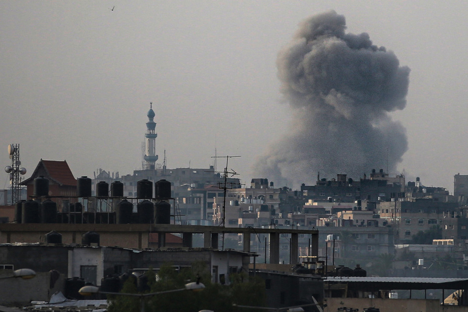 Israel bombs south and north of Gaza amid mass Palestinian exodus from Rafah