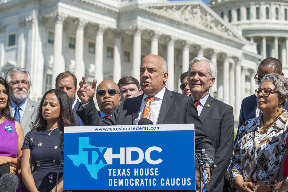 Texas House Democratic Caucus Chair Chris Turner speaks in front of the US Capitol on behalf of the state lawmakers who flew to DC to prevent a vote on a GOP-backed restrictive voting bill.