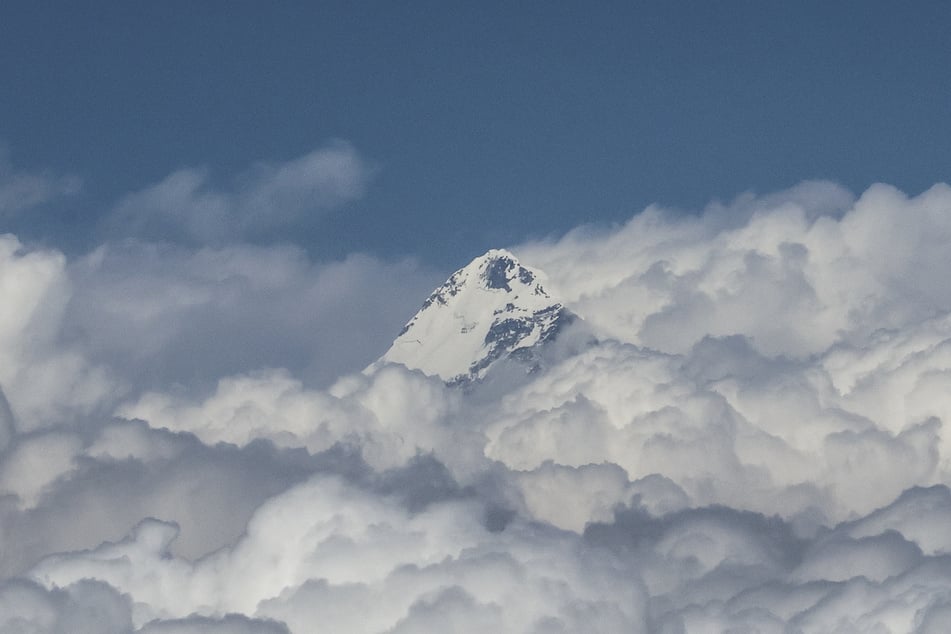 An aerial picture taken midair from an helicopter shows the summit of Mount Makalu, the fifth highest mountain in the world, in Nepal's Himalayas range.