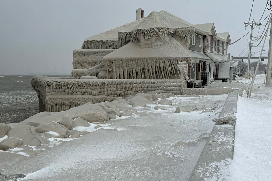 A restaurant is covered in ice from the spray of Lake Erie waves during a winter storm that hit the Buffalo region in Hamburg, New York.