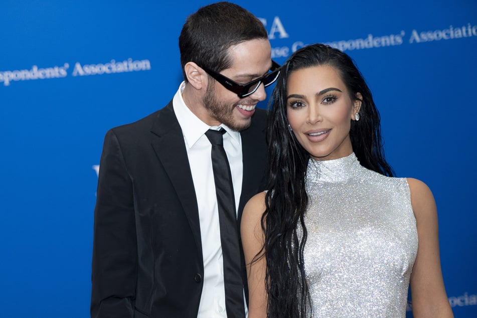 Kim Kardashian's alleged feelings on Pete Davidson (l.) expecting his first child have been revealed.