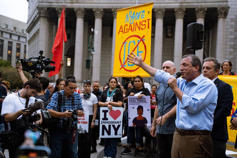 New York City Comptroller Brad Lander speaks in Foley Square as thousands gather to protest ICE on September 25, 2025.