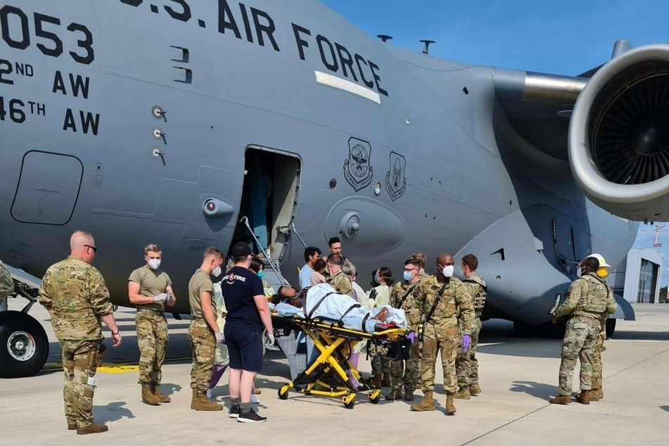 The commander of the aircraft with the call sign Reach 828 helped save the mother's life as she went into labor on the flight.