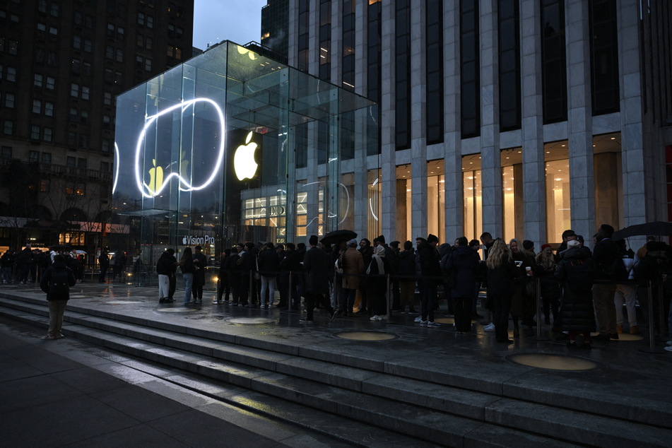 People line up outside a New York Apple Store on Friday as the Vision Pro headset is released in US Apple stores.