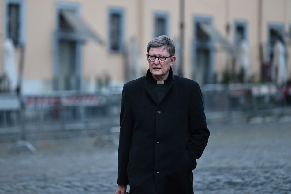 Kardinal Rainer Maria Woelki (66) geht gegen einen "Bild"-Reporter und den Axel Springer Verlag vor.