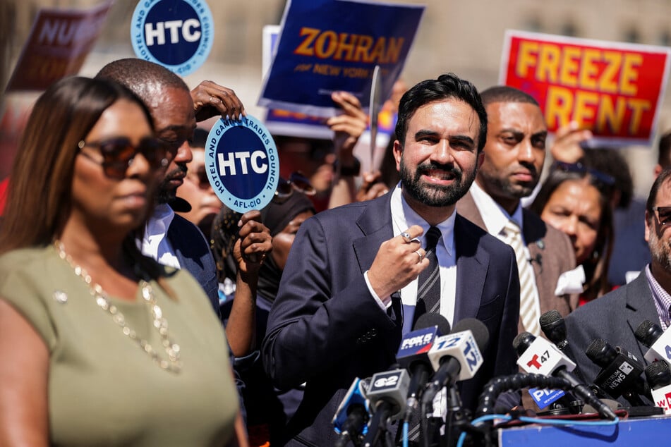 New York City mayoral candidate Zohran Mamdani (c.) has been endorsed by the Bronx Democratic Party.