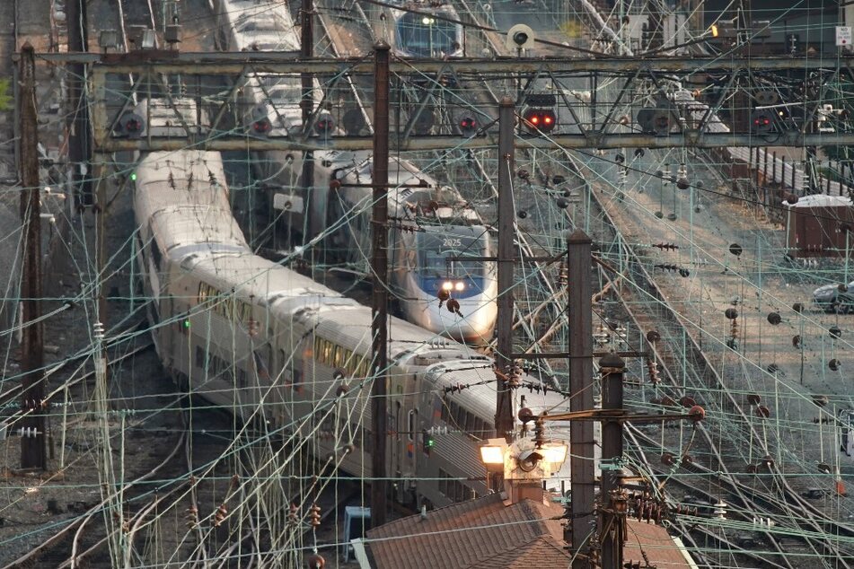 Amtrak trains travel through Washington DC on September 15, 2022.