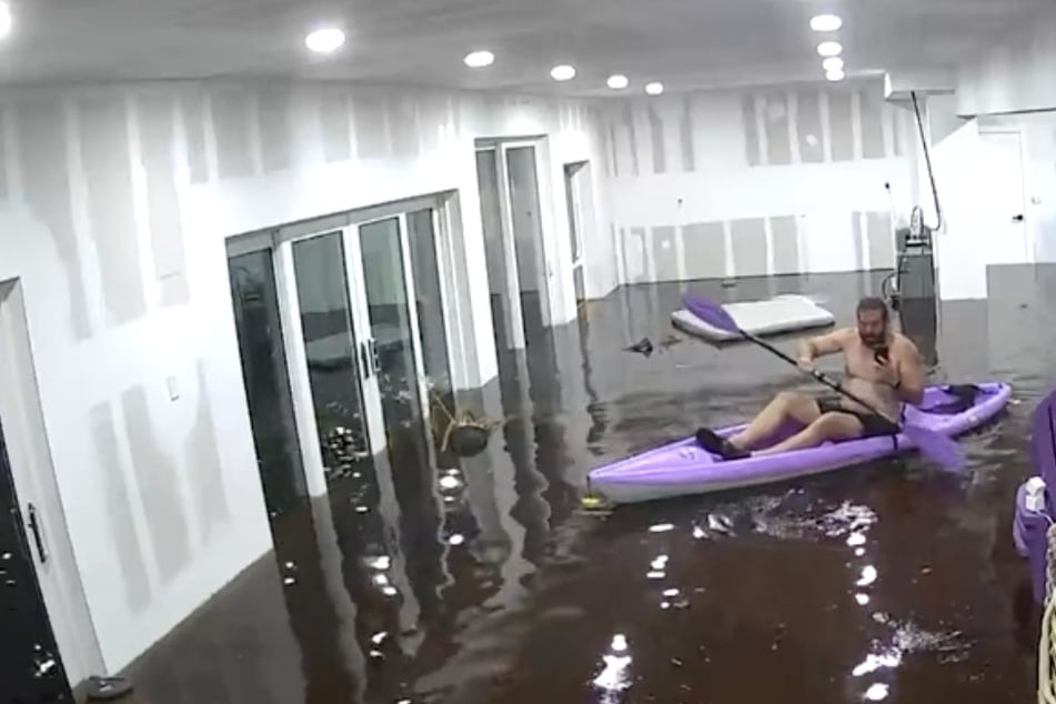 Florida resident Matthew Heller used a kayak to evade the flooding caused by Hurricane Helene.