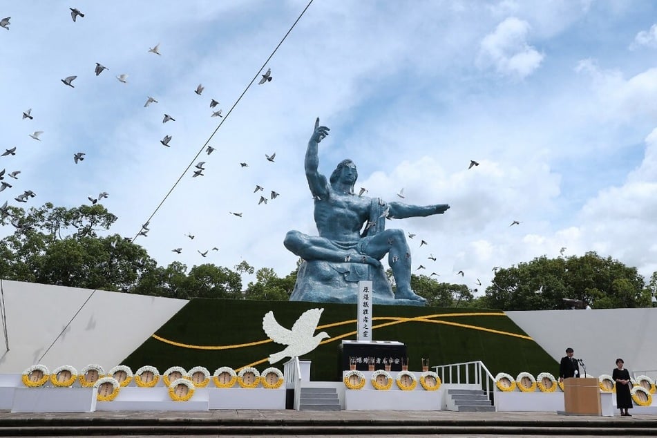 Doves are released into the air during a memorial ceremony at the Peace Park in Nagasaki on the anniversary of the US atomic bombing during World War II.