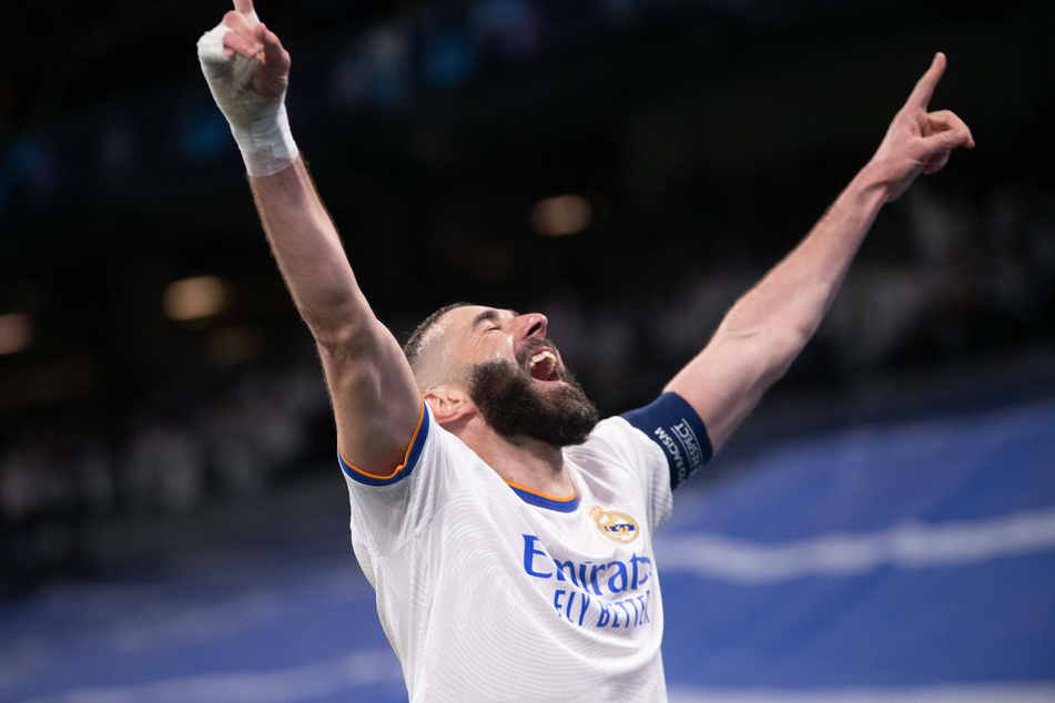 Karim Benzema celebrating his third goal against PSG.