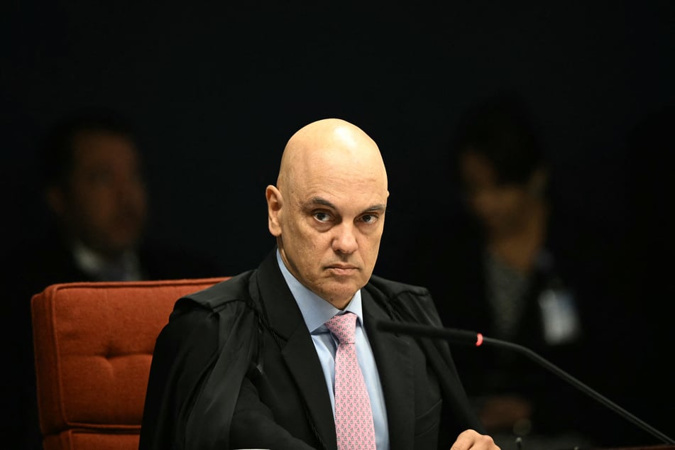 Brazil's Federal Supreme Court minister Alexandre de Moraes is pictured before the start of voting to convict or acquit far-right former president Jair Bolsonaro in a coup trial, on September 9, 2025.