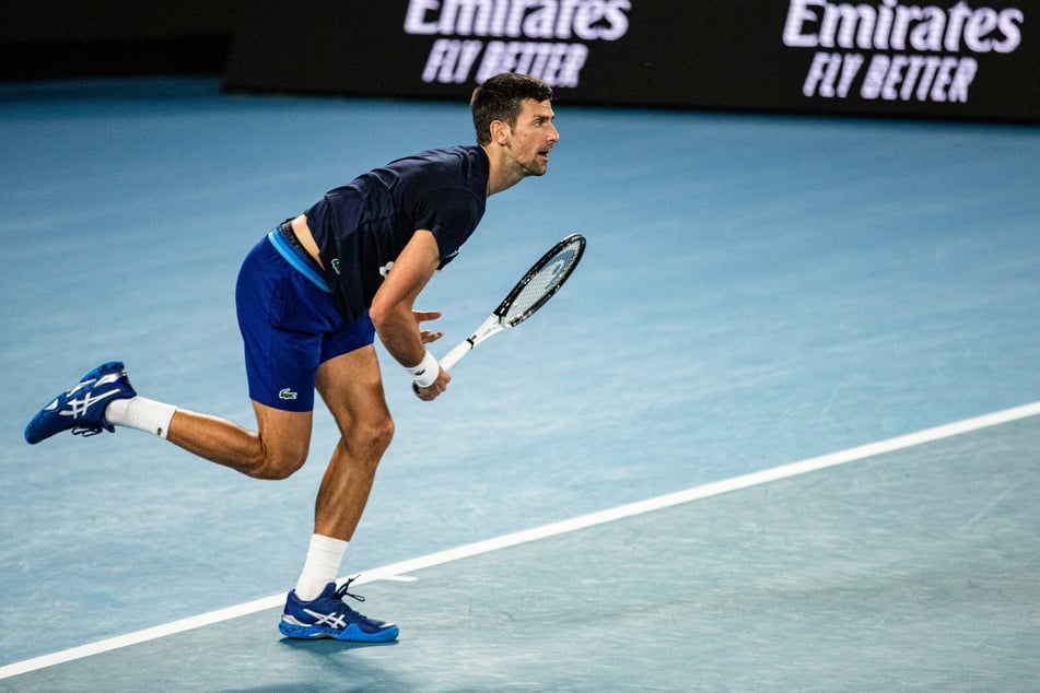 Novak Djokovic was seen on the court on Friday as he was allowed to practice ahead of the Australian Open at Melbourne Park.