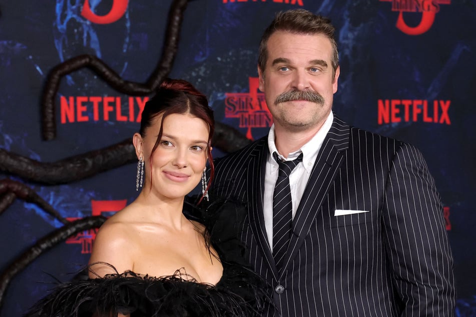 Millie Bobby Brown (l.) commented on her friendship with David Harbour after a report claimed she accused him of harassment and bullying.