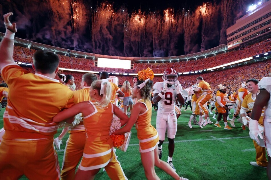 After a huge upset over Alabama, Tennessee Volunteer fans stormed the field at Neyland Stadium to celebrate the Vols' historic win.