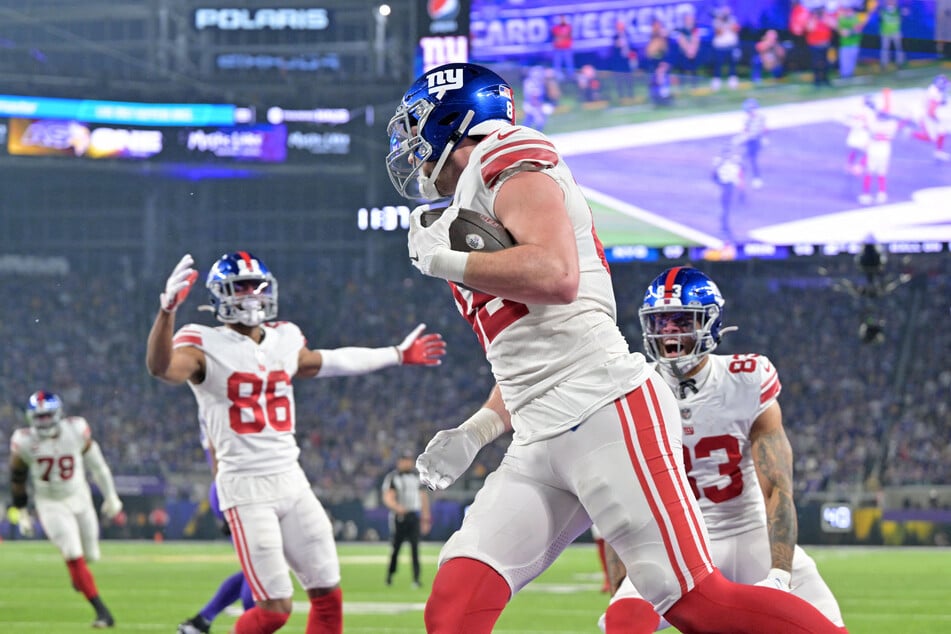 New York Giants tight end Daniel Bellinger scores a touchdown as their win over the Minnesota Vikings snaps a 10-season streak without a playoff win.