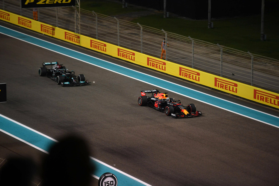 The dramatic moment when Max Verstappen passed Lewis Hamilton on the last lap.