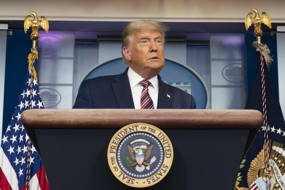 President Donald Trump gives a press briefing from the White House on Thursday evening.