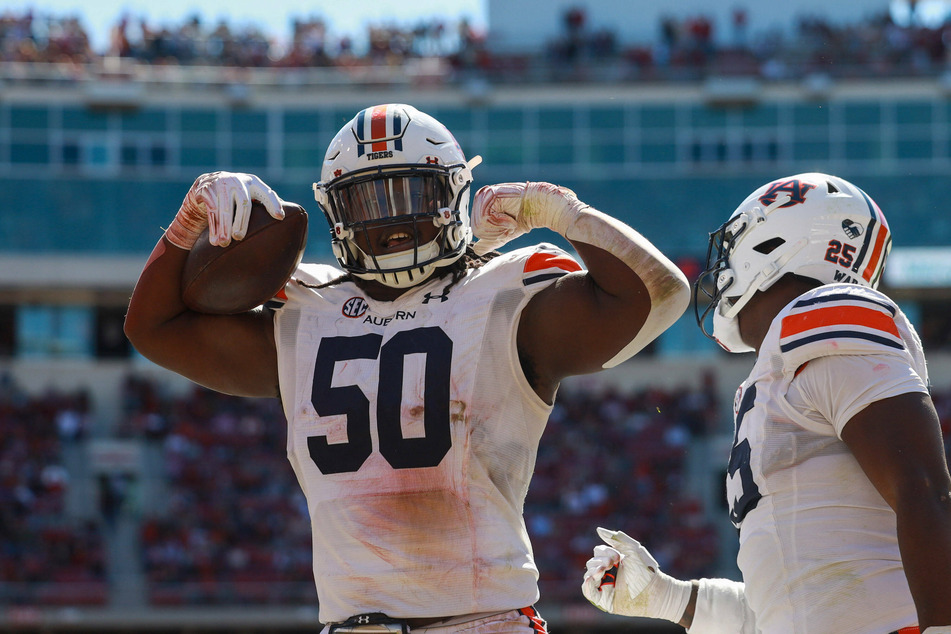 Defensive lineman Marcus Harris and the Tigers defense came up big in the fourth quarter to beat Ole Miss on Saturday.