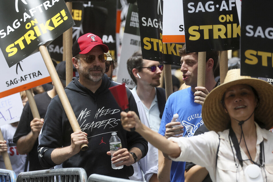 Hollywood stars join picket lines amid biggest strike in decades