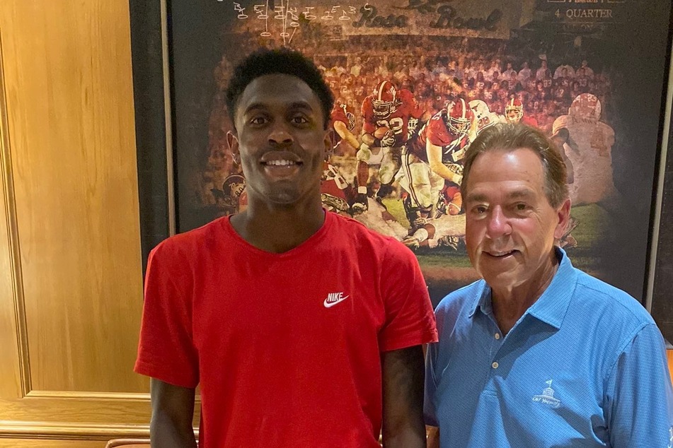 Malik Benson (l.) and Alabama head coach Nick Saban.