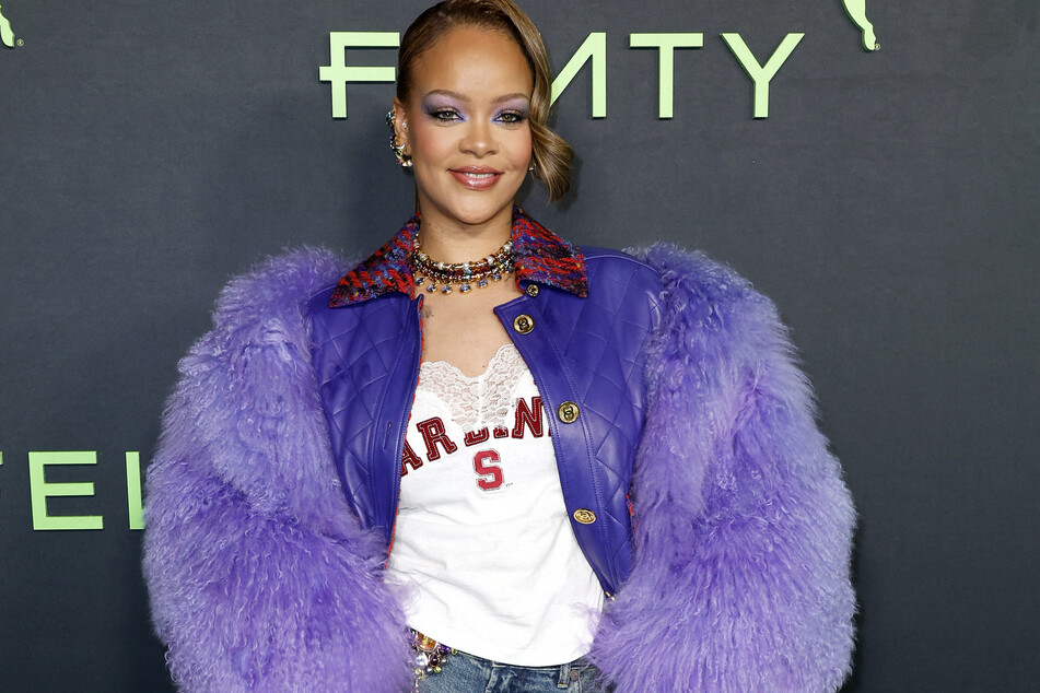 Rihanna pulled up to the relaunch of her Fenty x Puma collection in a stunning statement coat.