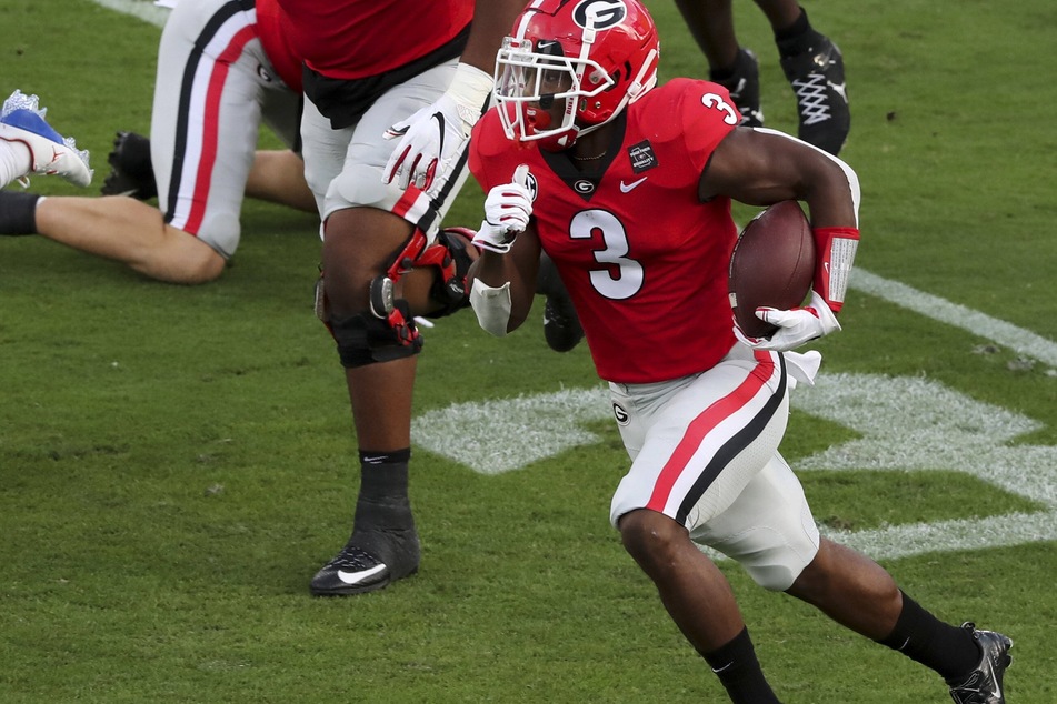 Georgia running back Zamir White scored three touchdowns in the Bulldogs' shutout of the Razorbacks on Saturday.