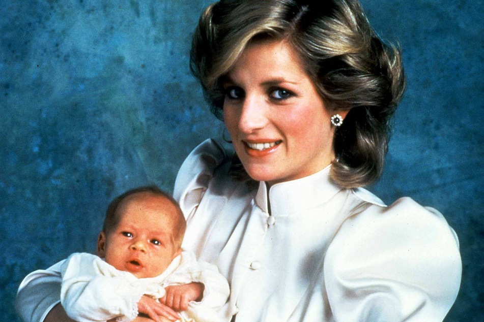 Princess Diana in 1984 holding newborn Prince Harry. (Archive image).