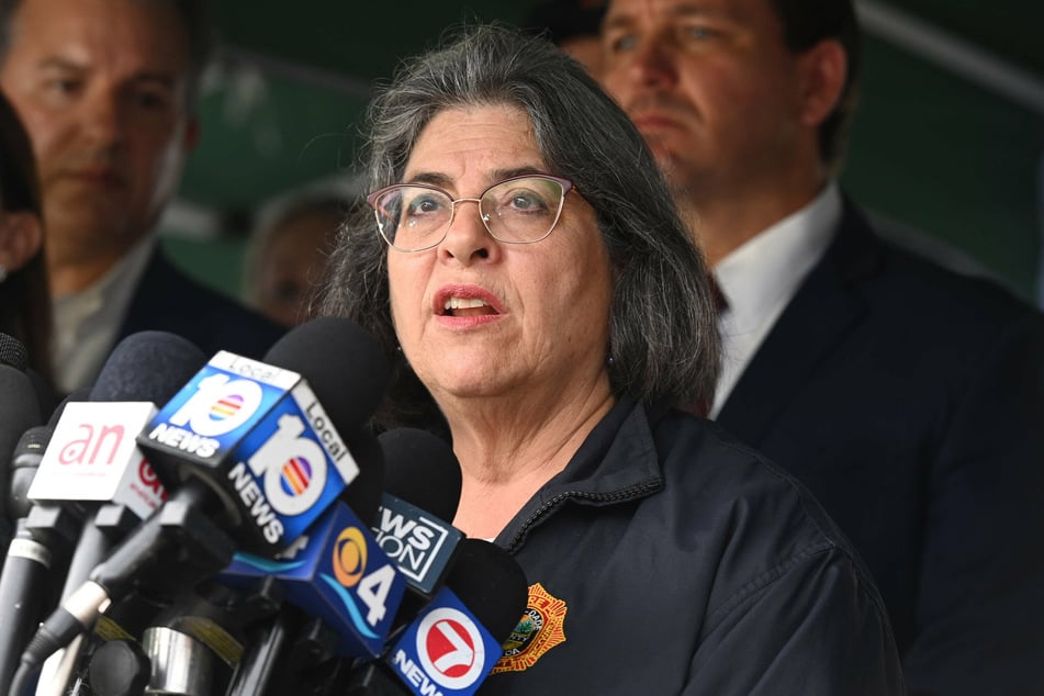Miami-Dade County Mayor Daniella Levine Cava, seen here speaking at a press conference on Thursday, updated the number of casualties and missing persons on Friday morning.