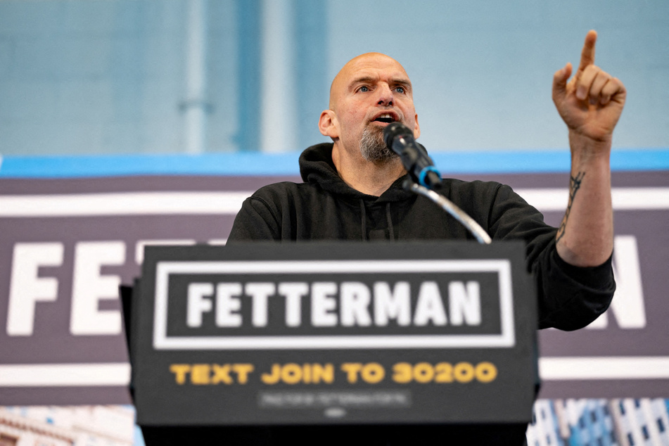 John Fetterman says he supports raising the federal minimum wage to at least $15 an hour.