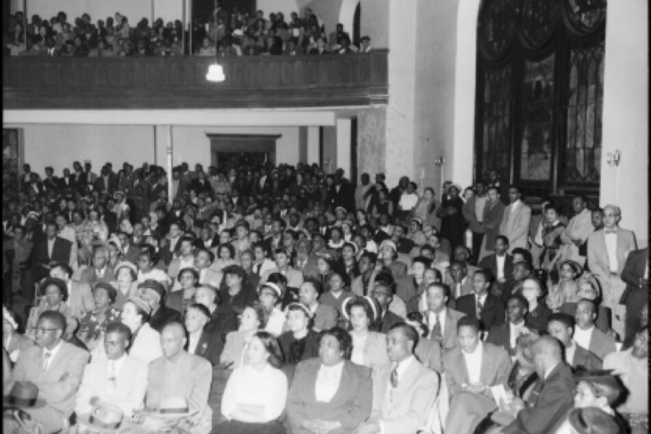 Community members gather at Bethel AME Church for a meeting on police brutality in April 1954.