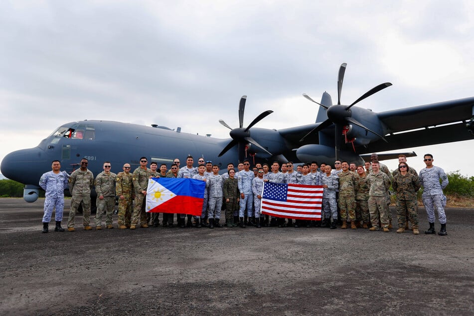Philippines and US test air defenses as China seizes disputed reef