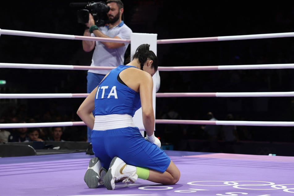 Angela Carini of Italy reacts after her fight against Imane Khelif of Algeria at the Paris Olympics.