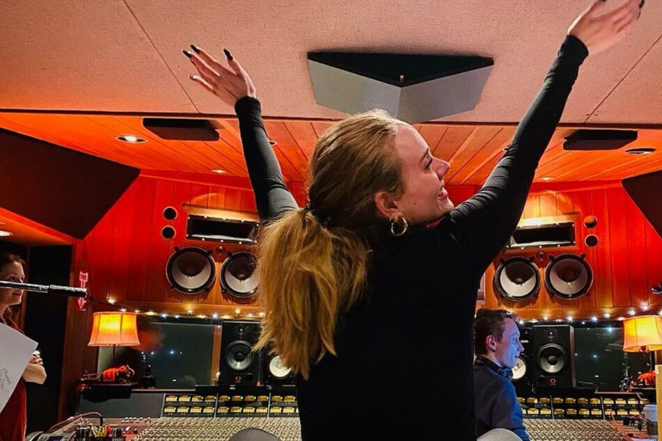 Adele poses in the recording studio while working on her fourth studio album, 30.