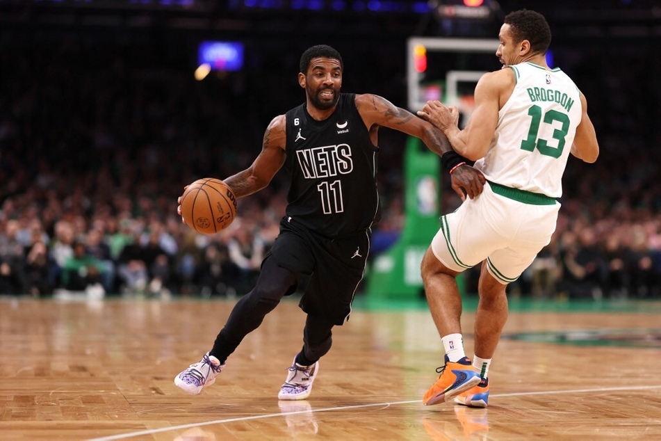 Kyrie Irving (l) will become a huge asset for the Dallas Mavericks' offense, which lacks a dominant player like Irving who can score big on the court.