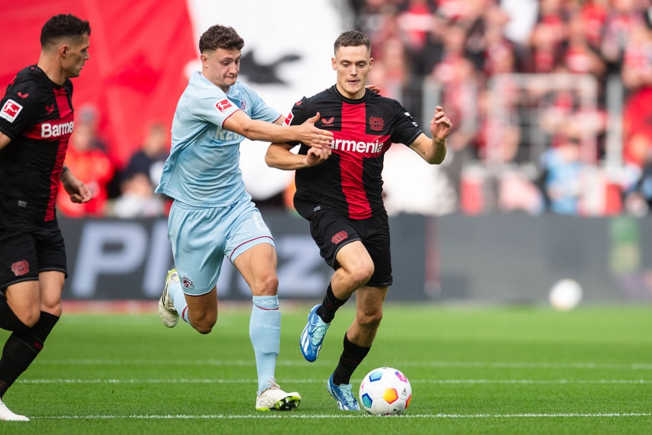 Beim letzten Duell in der BayArena im Oktober 2023 setzten sich Florian Wirtz (21, r.) und Co. souverän mit 3:0 gegen Eric Martel (22, M.) und die Kölner durch.