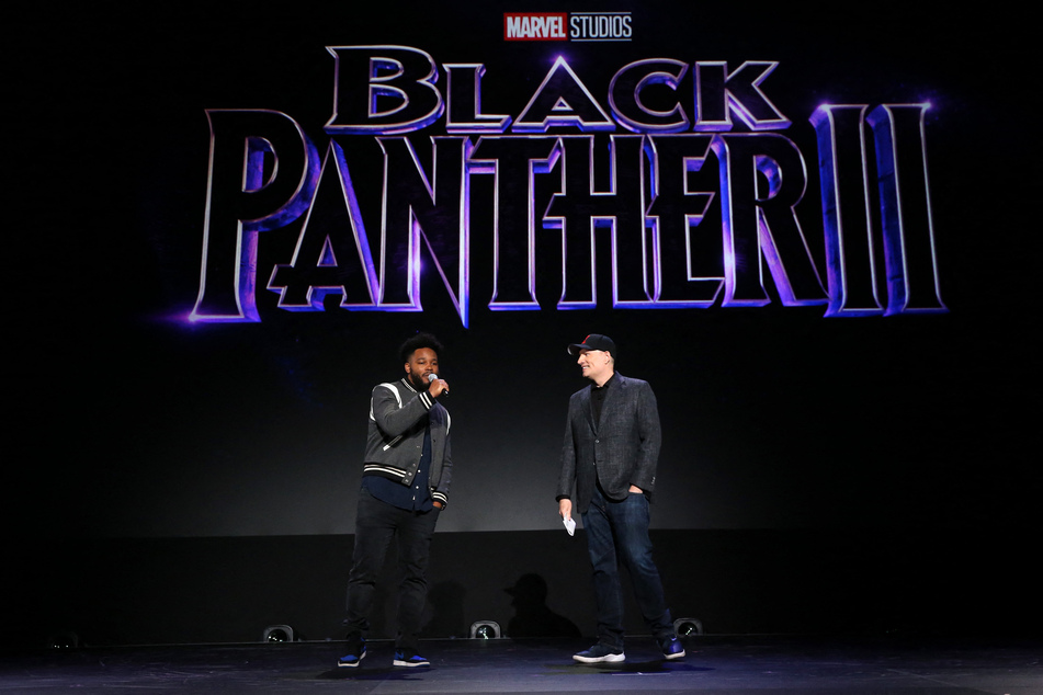 Ryan Coogler (l) joins Kevin Feige on stage to present new footage from Black Panther: Wakanda Forever.