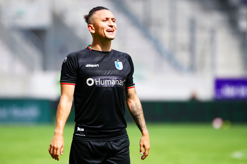 Baris Atik (26) wirft Dennis Erdmann (30) vor, ihn und andere Magdeburger Spieler rassistisch beleidigt zu haben.