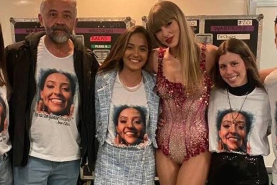 Taylor Swift poses backstage with her late fan's family at her recent Brazil concert.