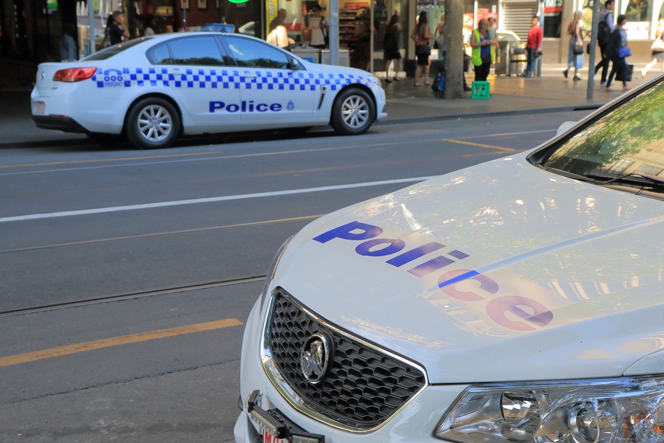 The Australian Federal Police arrested a 45-year-old ex-childcare worker on hundreds of child abuse charges.