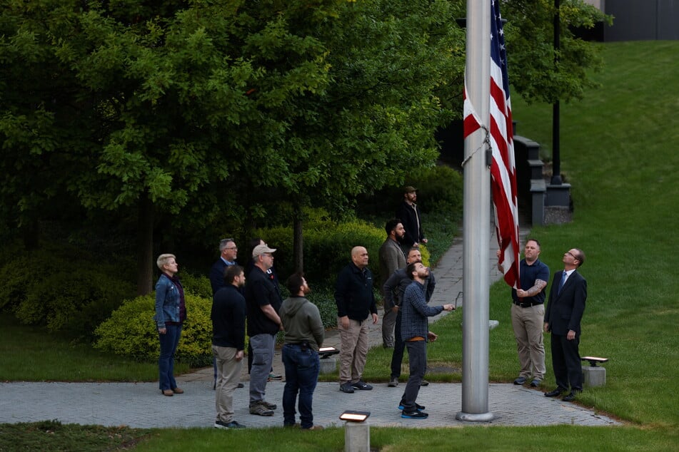 The US flag being raised after the official reopening of the Kyiv embassy.