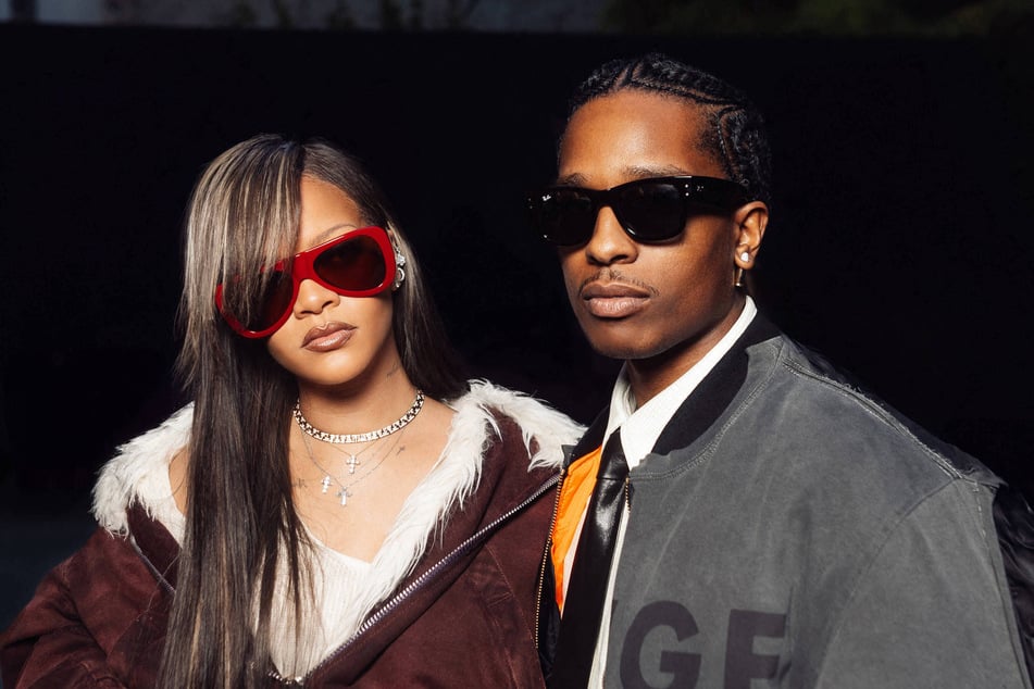 Rihanna and A$AP Rocky (r.) jetted off to Barbados after the rapper's trial got postponed.