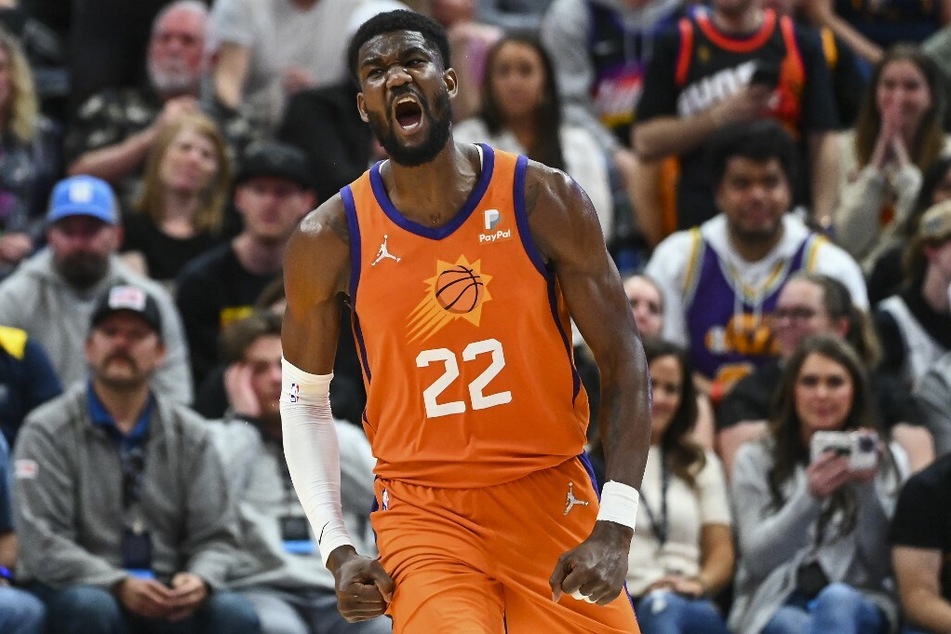 Phoenix Suns' center Deandre Ayton celebrates a basket in a game against the Utah Jazz.