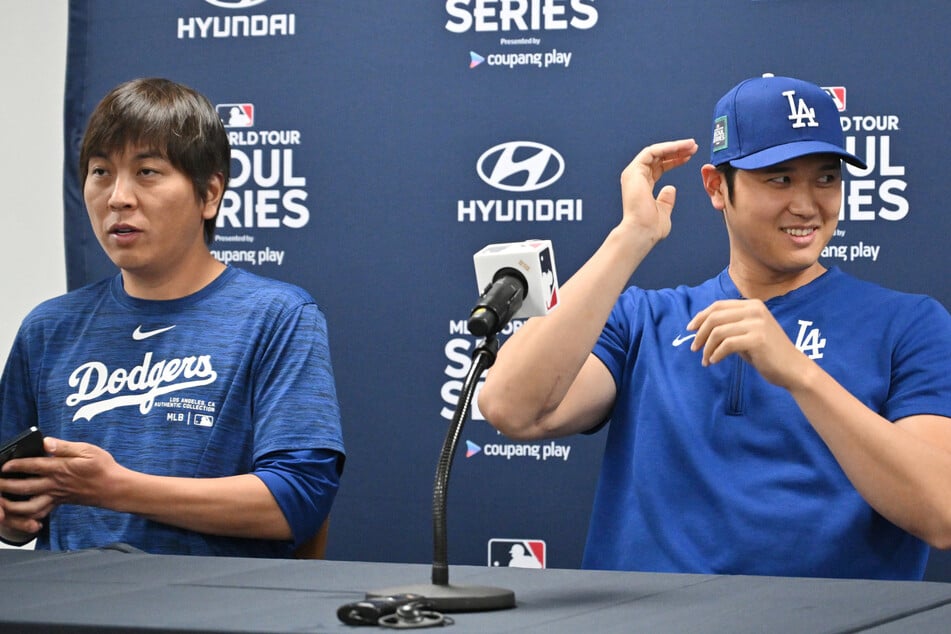 The MLB has opened a formal investigation into the scandal involving Los Angeles Dodgers star Shohei Ohtani (r.) and his former interpreter.